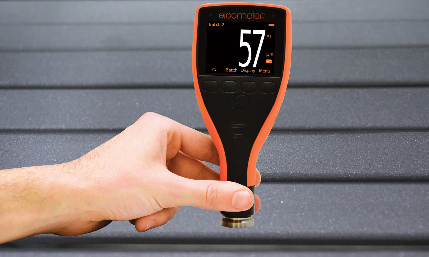 Elcometer 224 digital surface profile gauge on blasted steel surface