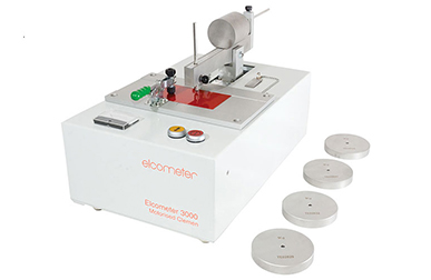 Elcometer 3000 motorised Clemen unit performing scratch test